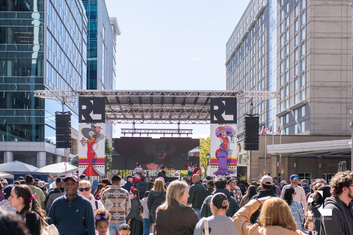Revista Latina main stage and crowd at the Day of the Dead Festival — Downtown Raleigh 2025